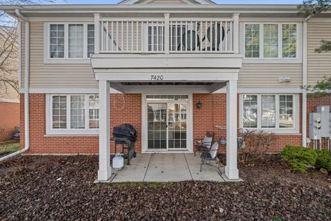 a front view of a house with a porch