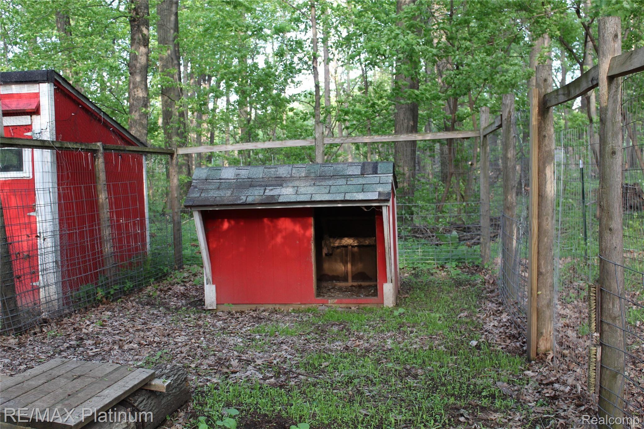 5834 Mack Road Howell, MI 48855 - Photo 15 of 53 goat/dog house and pen