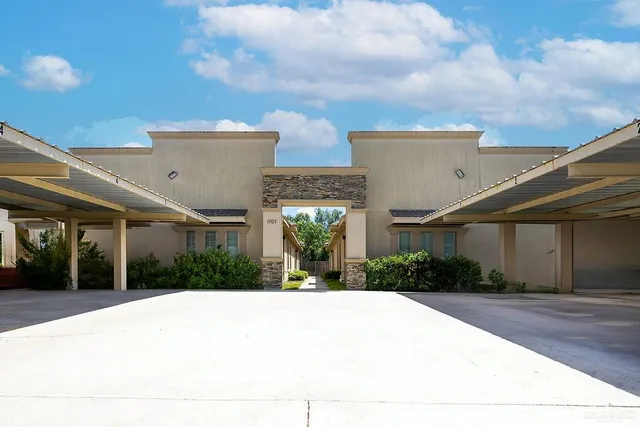 a house view with a garden space
