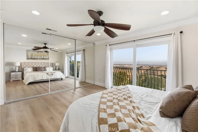 a bedroom with two beds and a couch