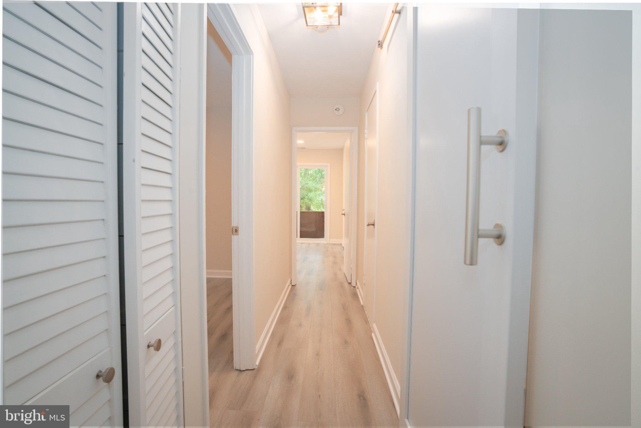 5860 Thunder Hill Road, Unit C1 Columbia, MD 21045 - Photo 4 of 22 Bright and inviting hallway retreat.