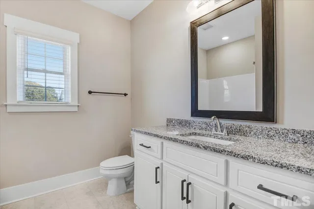 a close up of a bathtub with a shower