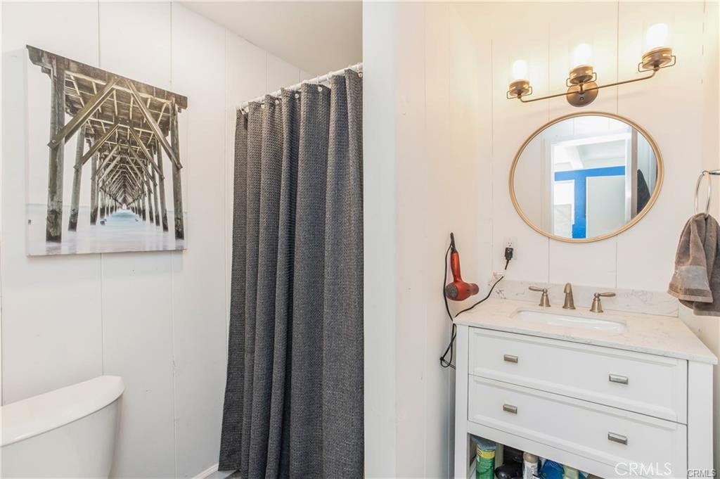 31711 Fairview Road Laguna Beach, CA 92651 - Photo 17 of 20 a bathroom with a sink and a mirror