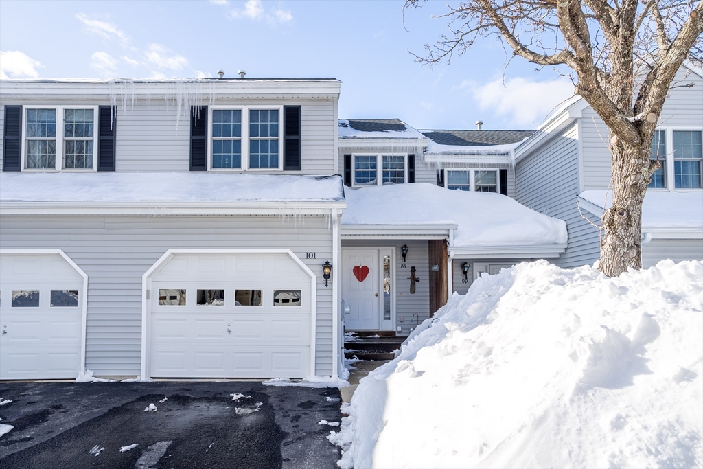 101 Bridle Cross Road, Unit 101 Fitchburg, MA 01420 - Photo 1 of 26 a front view of a house with a yard