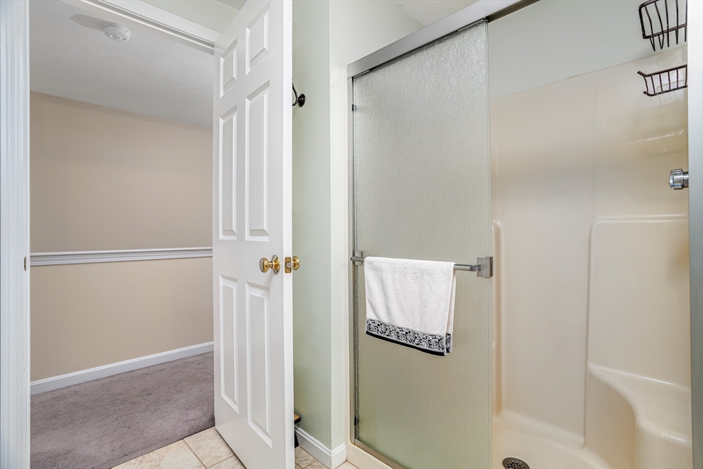 101 Bridle Cross Road, Unit 101 Fitchburg, MA 01420 - Photo 22 of 26 a bathroom with a shower