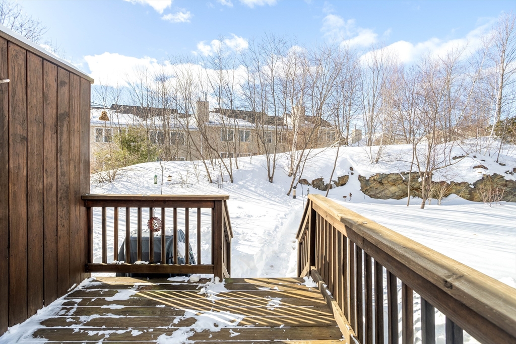 101 Bridle Cross Road, Unit 101 Fitchburg, MA 01420 - Photo 25 of 26 a view of a porch with a yard