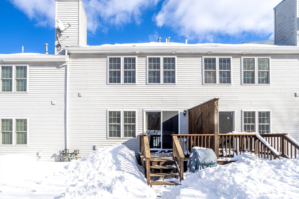 101 Bridle Cross Road, Unit 101 Fitchburg, MA 01420 - Photo 26 of 26 a front view of a house with a patio