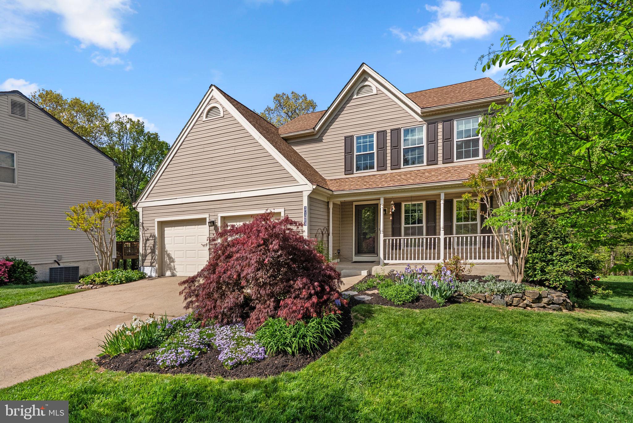 3128 Memory Lane Silver Spring, MD 20904 - Photo 3 of 49 Charming home with vibrant landscaping.