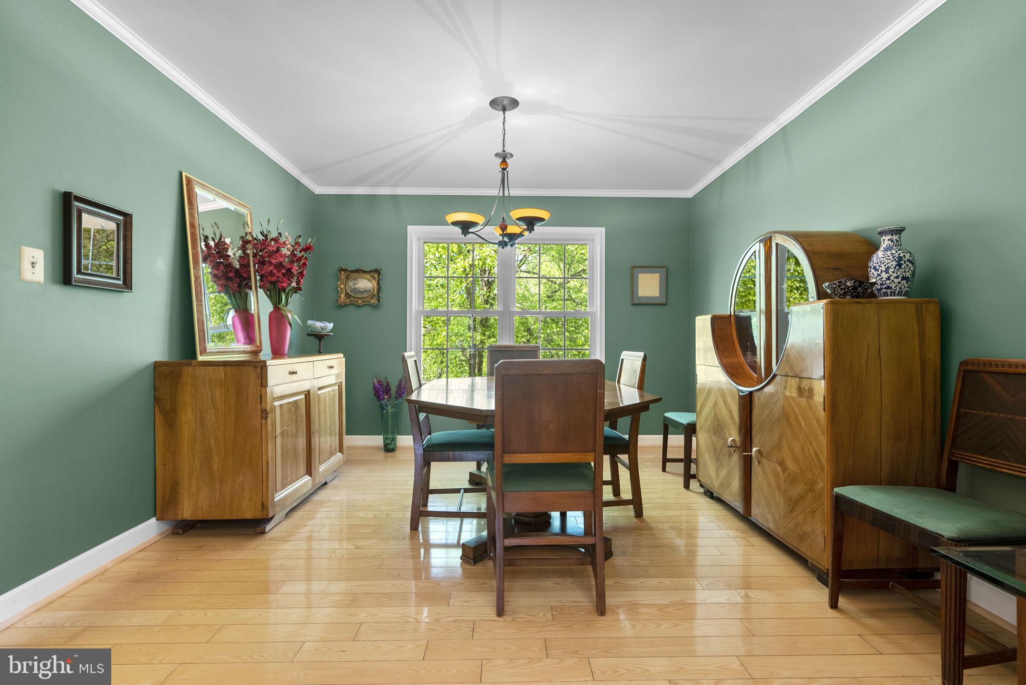 3128 Memory Lane Silver Spring, MD 20904 - Photo 9 of 49 Formal dining room with wood floors.