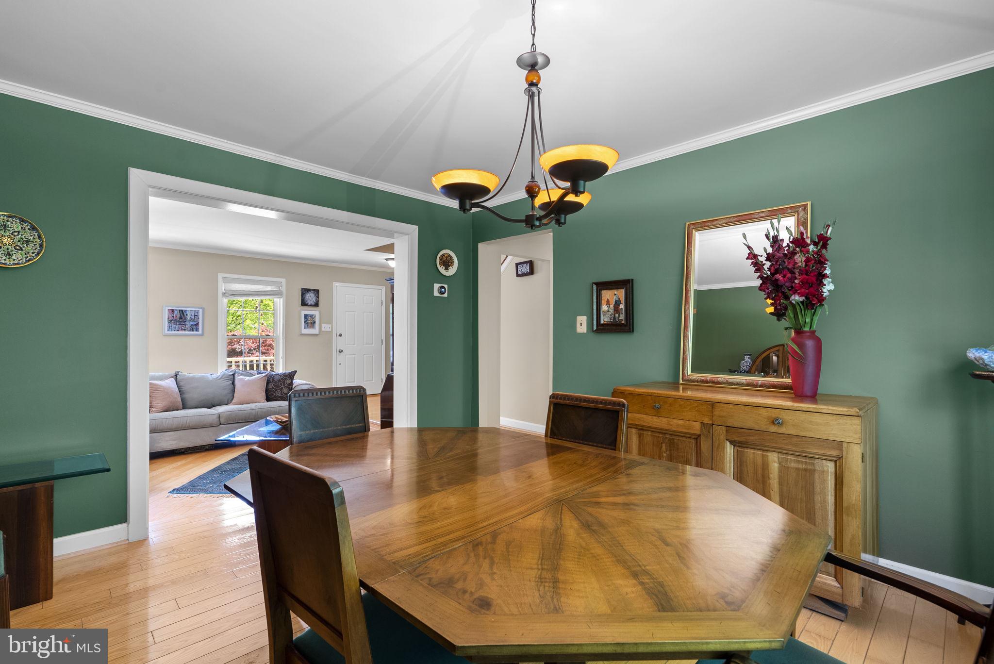 3128 Memory Lane Silver Spring, MD 20904 - Photo 10 of 49 Charming dining room with elegant chandelier.
