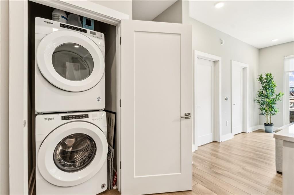 22 Airline Street Southeast, Unit 204 Atlanta, GA 30312 - Photo 19 of 34 a view of a hallway with washer and dryer