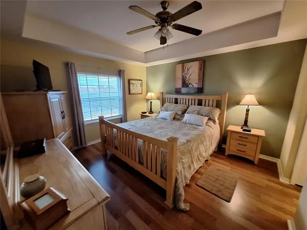 a bed room with a bed and a window