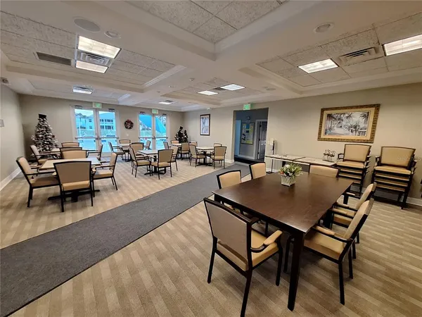 a view of a dining room with furniture