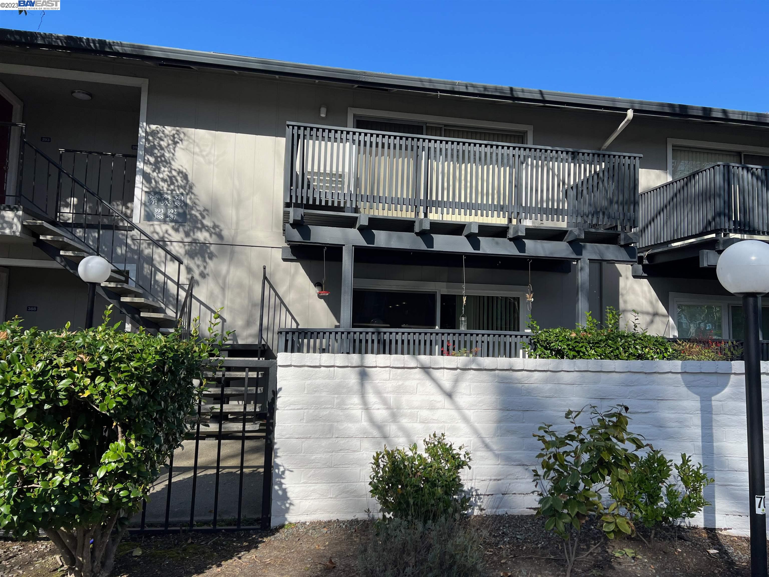 9085 Alcosta Boulevard, Unit 389 San Ramon, CA 94583 - Photo 1 of 1 a front view of a house with garage