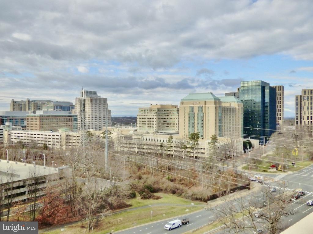 11800 Sunset Hills Road, Unit 118 Reston, VA 20190 - Photo 52 of 52 Urban skyline under moody skies.