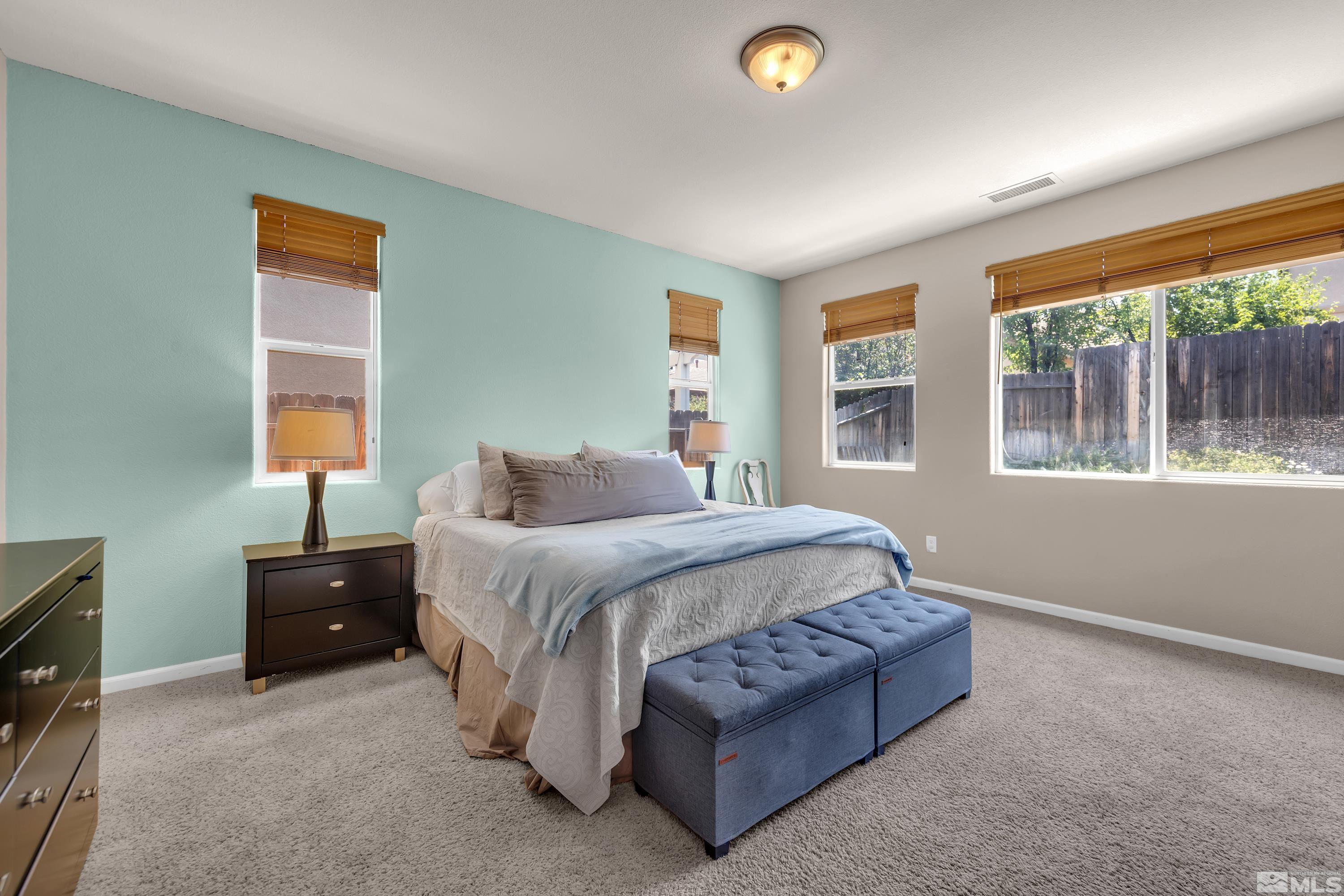 2100 Angel Ridge Drive Reno, NV 89521 - Photo 17 of 35 a bedroom with a bed and a window