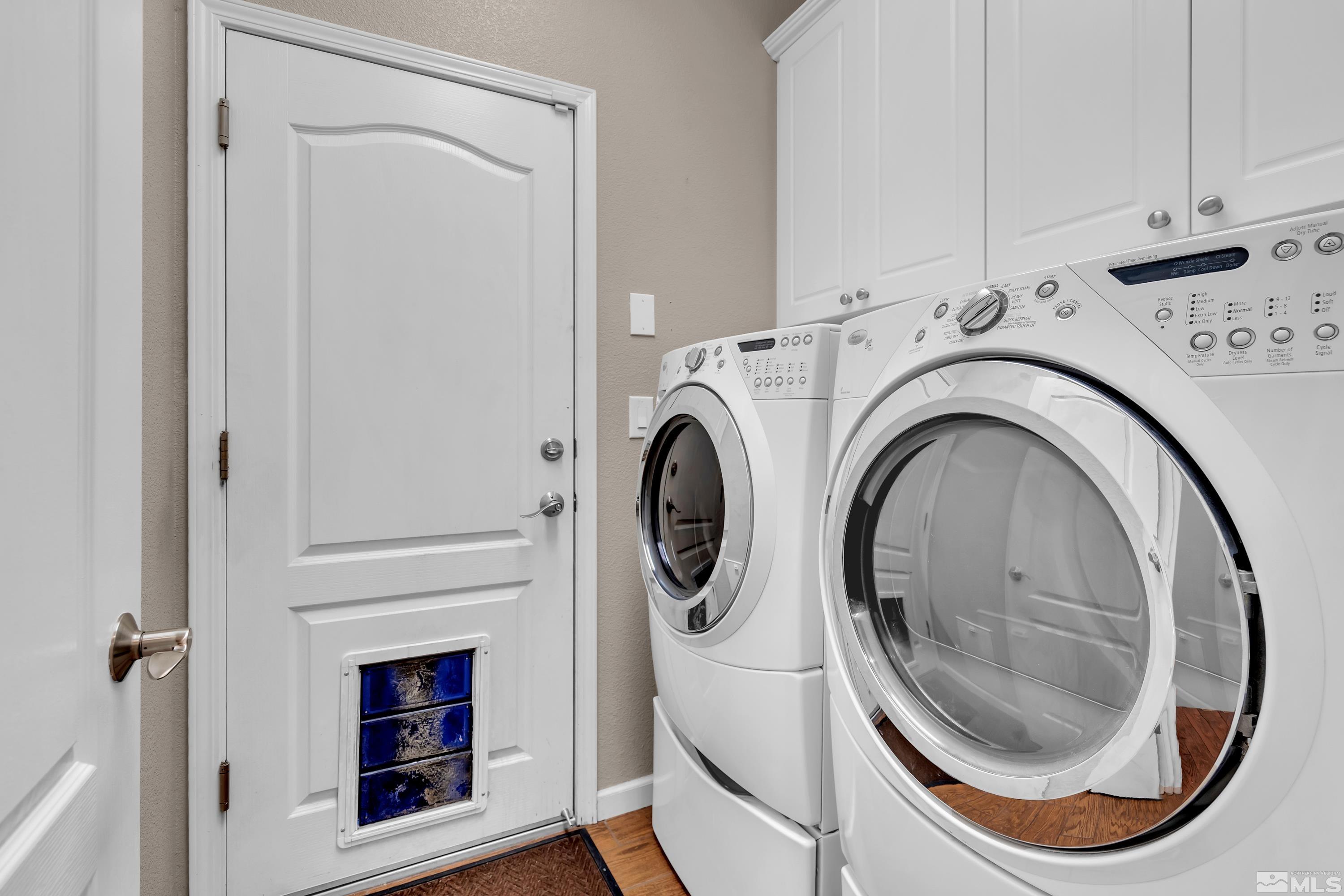 2100 Angel Ridge Drive Reno, NV 89521 - Photo 26 of 35 a utility room with dryer and washer