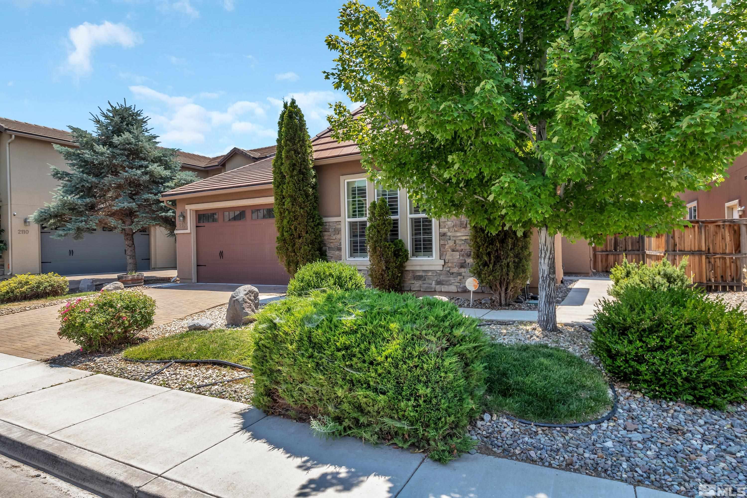 2100 Angel Ridge Drive Reno, NV 89521 - Photo 28 of 35 a front view of a house with garden
