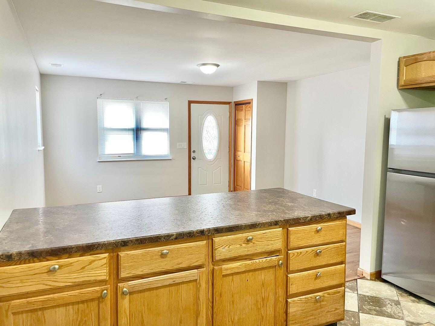 28 South St Road Valparaiso, IN 46385 - Photo 4 of 16 a view of a kitchen counter space and window