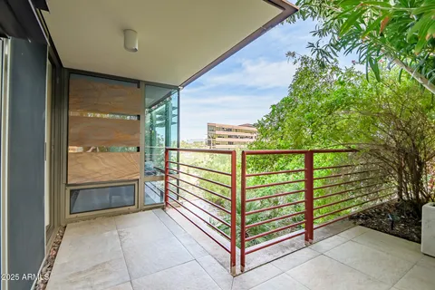 a view of a balcony with outdoor space
