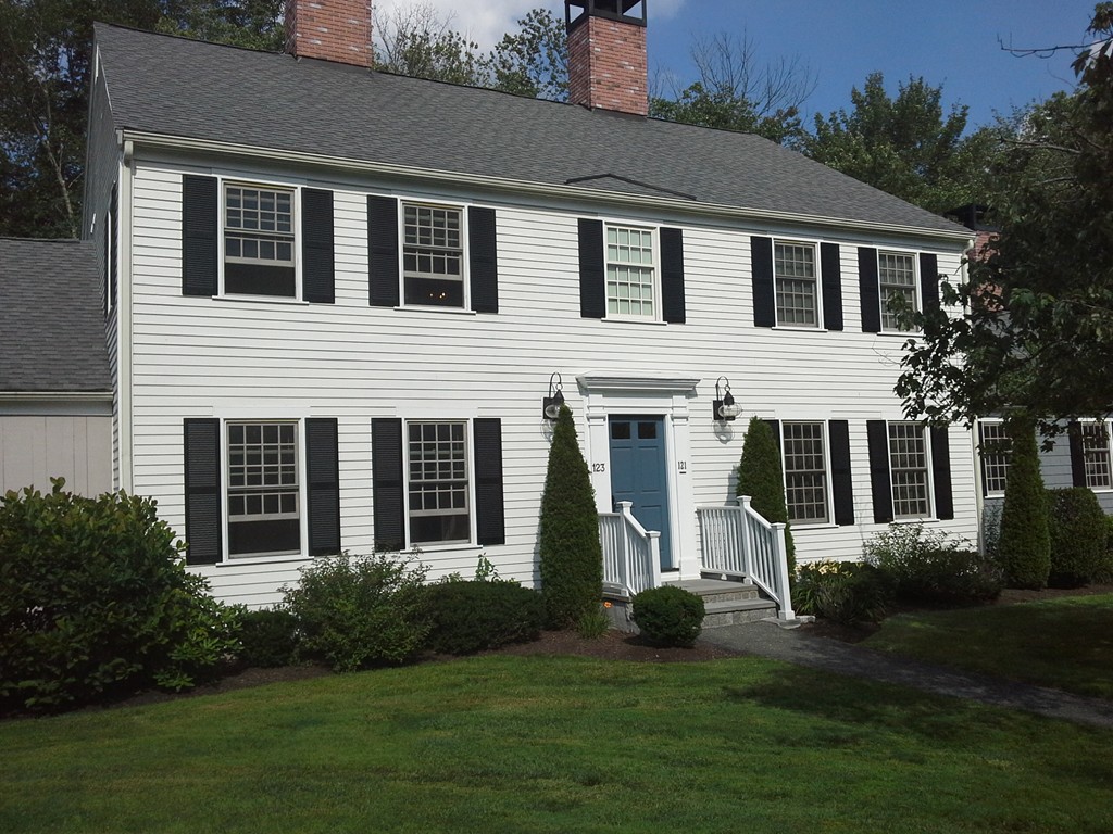 123 Jericho Road, Unit 123 Weston, MA 02493 - Photo 1 of 12 a front view of a house with a yard