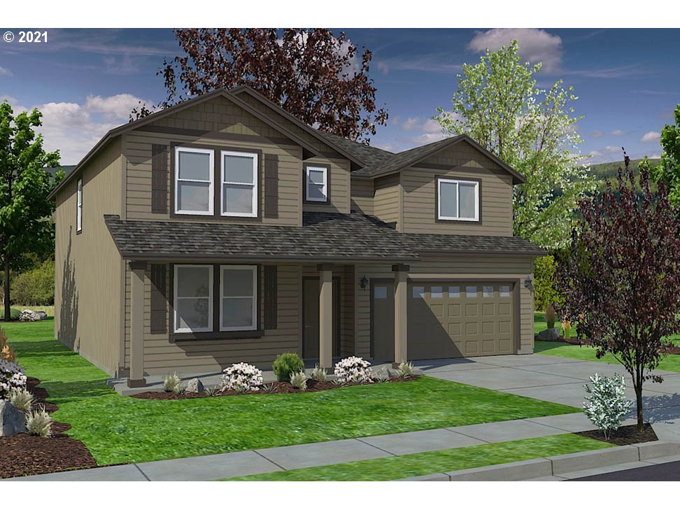 5252 Squirrel Street Springfield, OR 97478 - Photo 2 of 15 a front view of a house with a yard