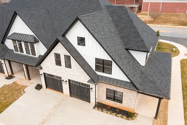 a front view of a house with garage