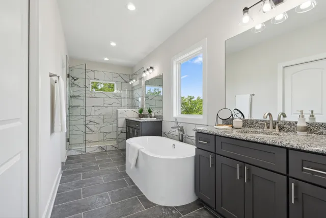 a bathroom with a sink a vanity and a mirror