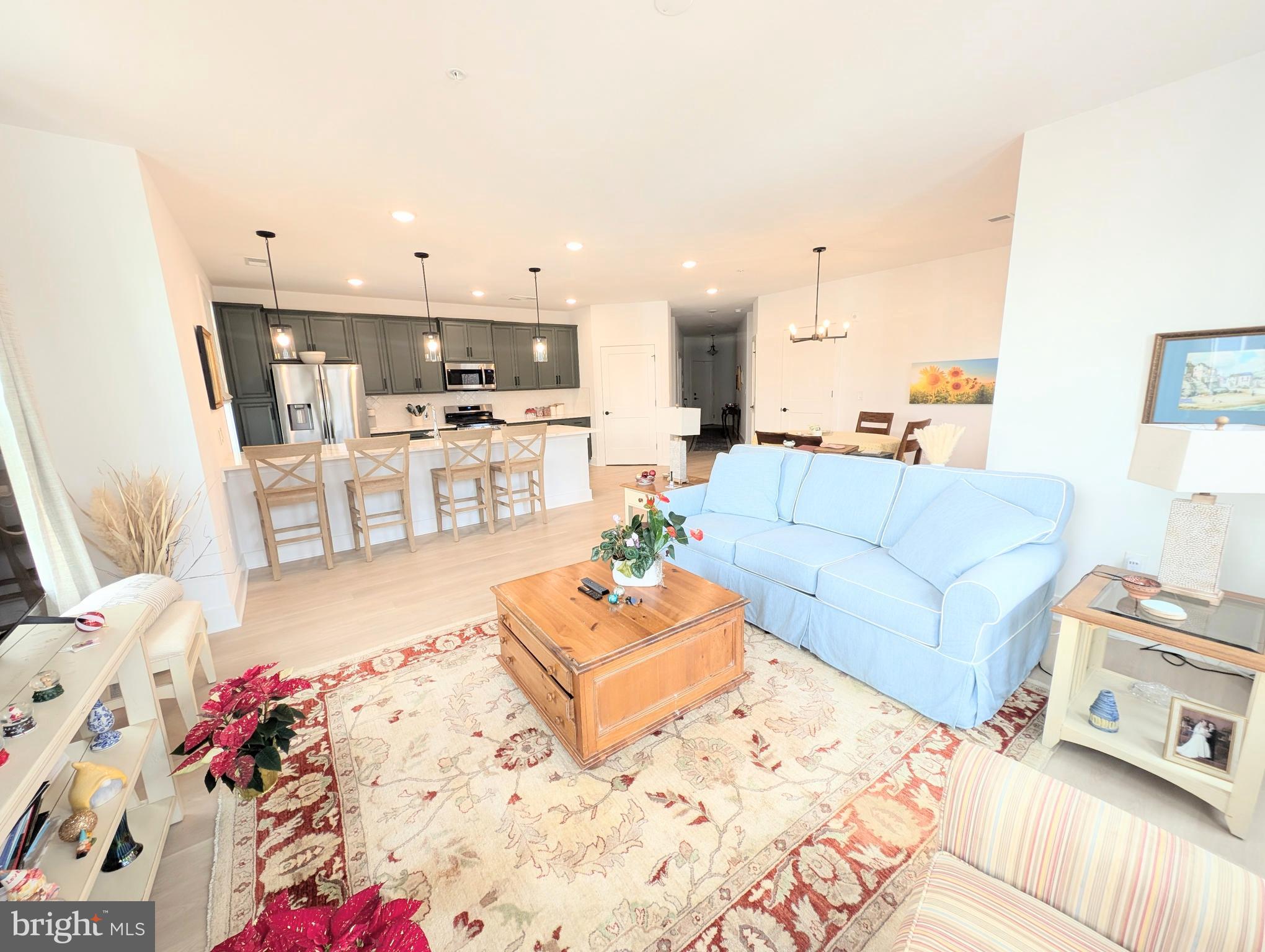 78 Old Mill Bottom Road North, Unit 101 Annapolis, MD 21409 - Photo 1 of 29 a living room with furniture and a wooden floor