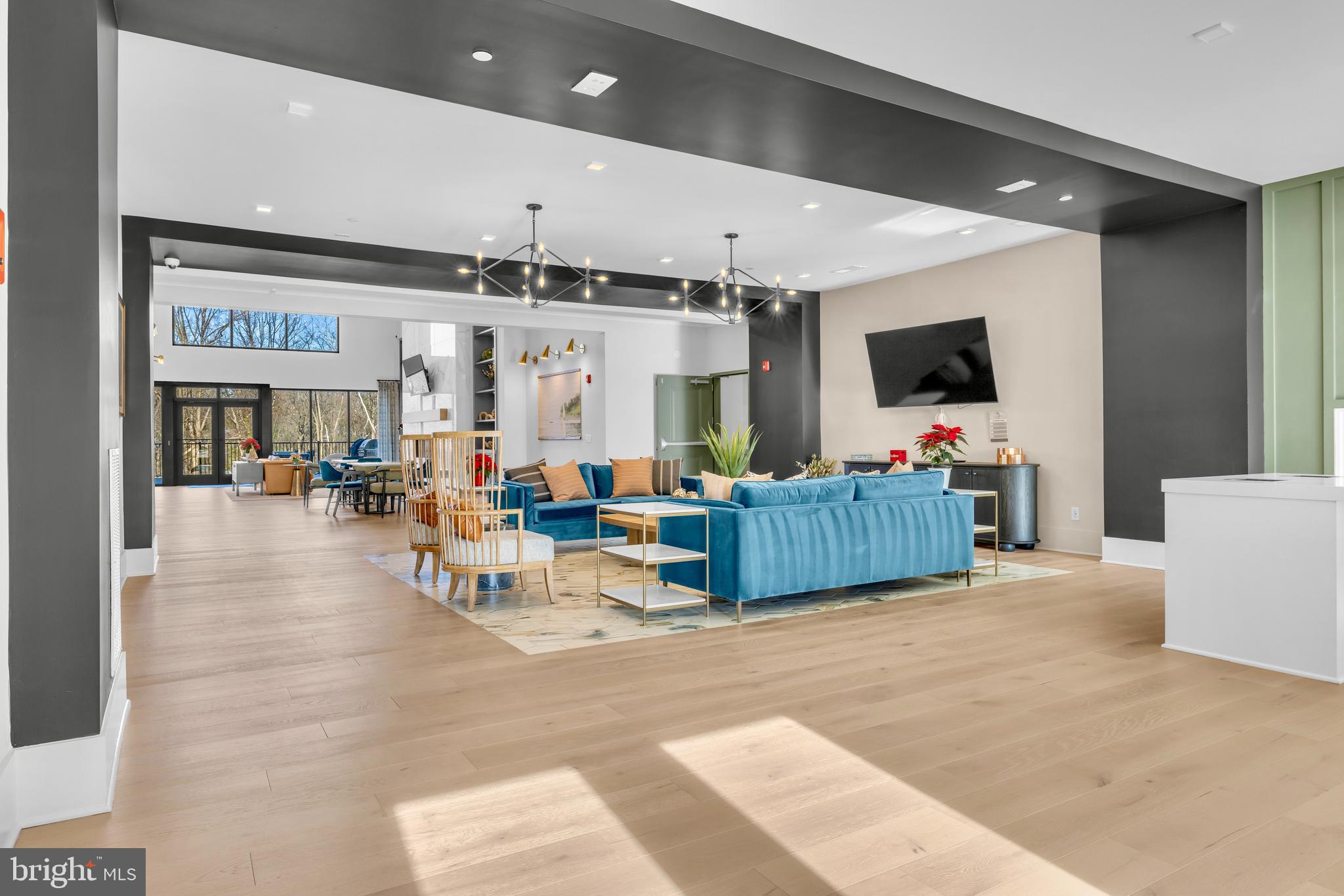 78 Old Mill Bottom Road North, Unit 101 Annapolis, MD 21409 - Photo 23 of 29 a living room with furniture and a flat screen tv