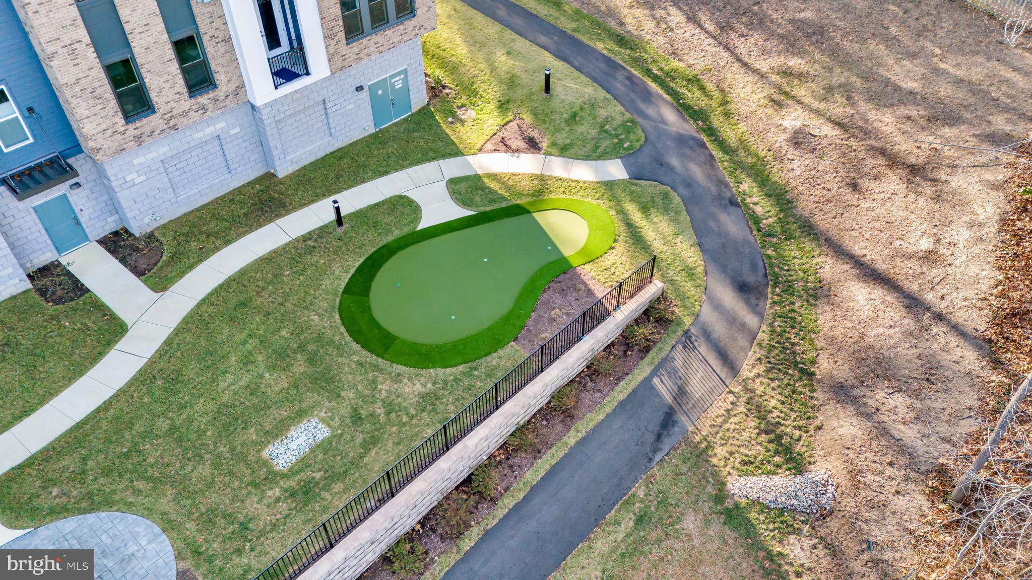 78 Old Mill Bottom Road North, Unit 101 Annapolis, MD 21409 - Photo 25 of 29 a view of swimming pool with a tub and a tub