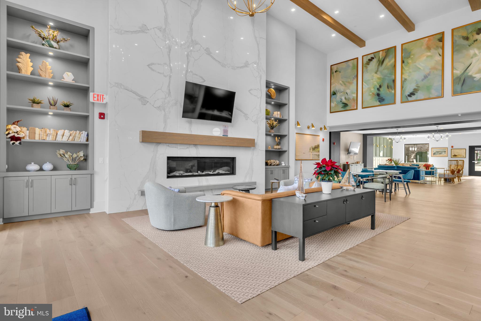 78 Old Mill Bottom Road North, Unit 101 Annapolis, MD 21409 - Photo 27 of 29 a living room with furniture and a fireplace