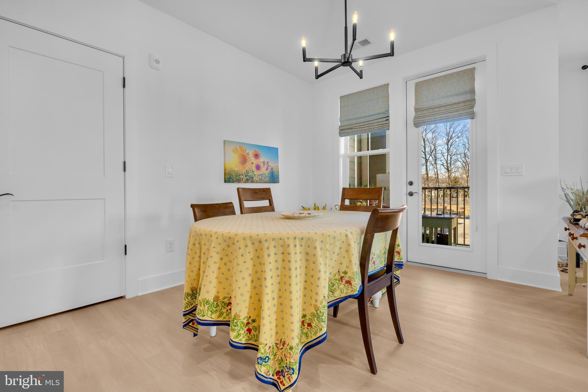 78 Old Mill Bottom Road North, Unit 101 Annapolis, MD 21409 - Photo 8 of 29 a bedroom with a bed and a table