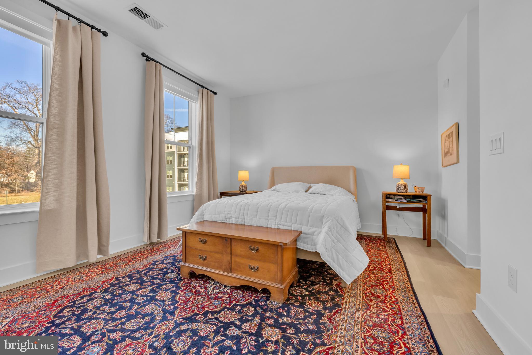 78 Old Mill Bottom Road North, Unit 101 Annapolis, MD 21409 - Photo 9 of 29 a bedroom with a bed and a window