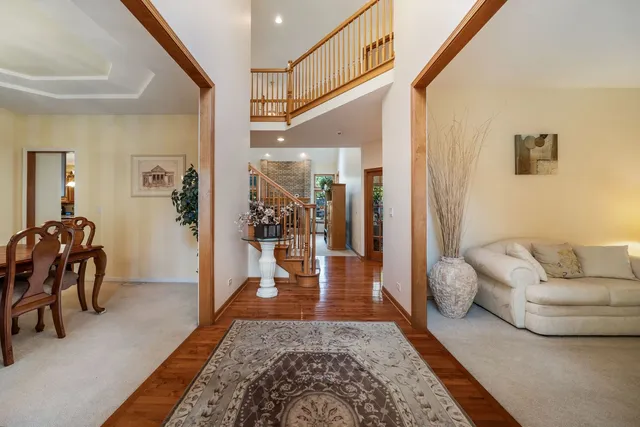 a living room with furniture and a rug