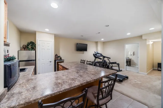 a view of a kitchen and dining room
