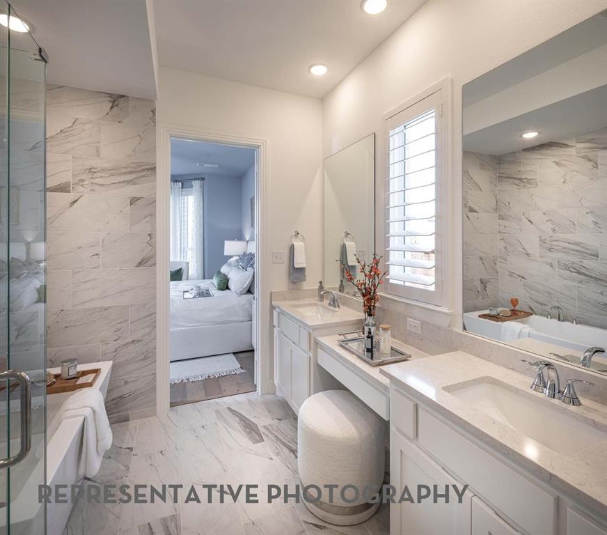 8903 Wildberry Road Oak Point, TX 75068 - Photo 16 of 31 a bathroom with a sink and a mirror