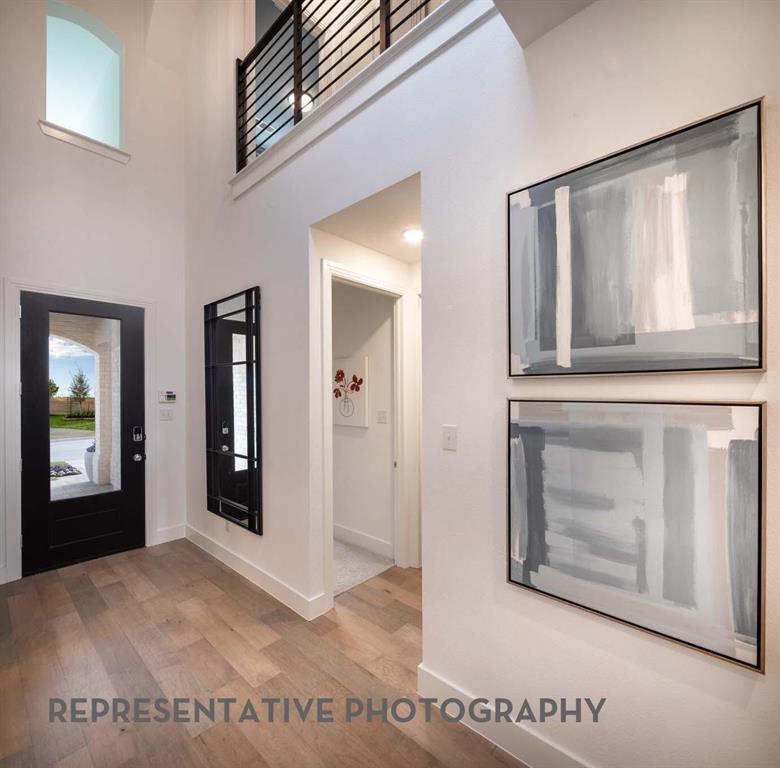 8903 Wildberry Road Oak Point, TX 75068 - Photo 24 of 31 a view of a room that has a large window