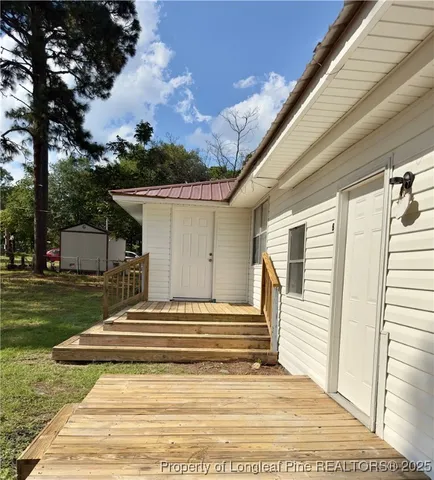 a view of a back yard of a house