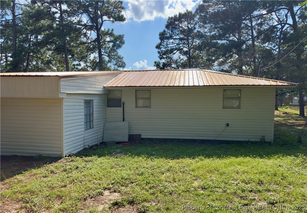 2357 A Watson Lake Road Fayetteville, NC 28306 - Photo 13 of 14 a view of a backyard