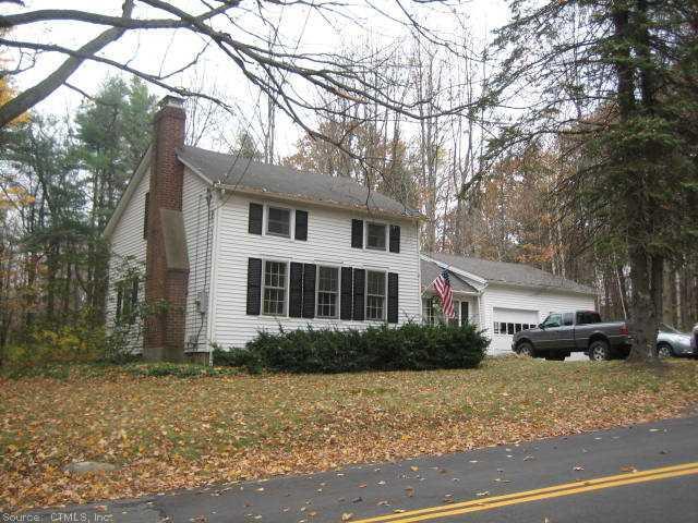 56 Edgerton Road Barkhamsted, CT 06063 - Photo 1 of 1 a front view of a house with a garden