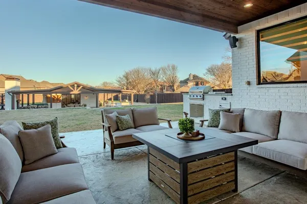 a view of a terrace with furniture