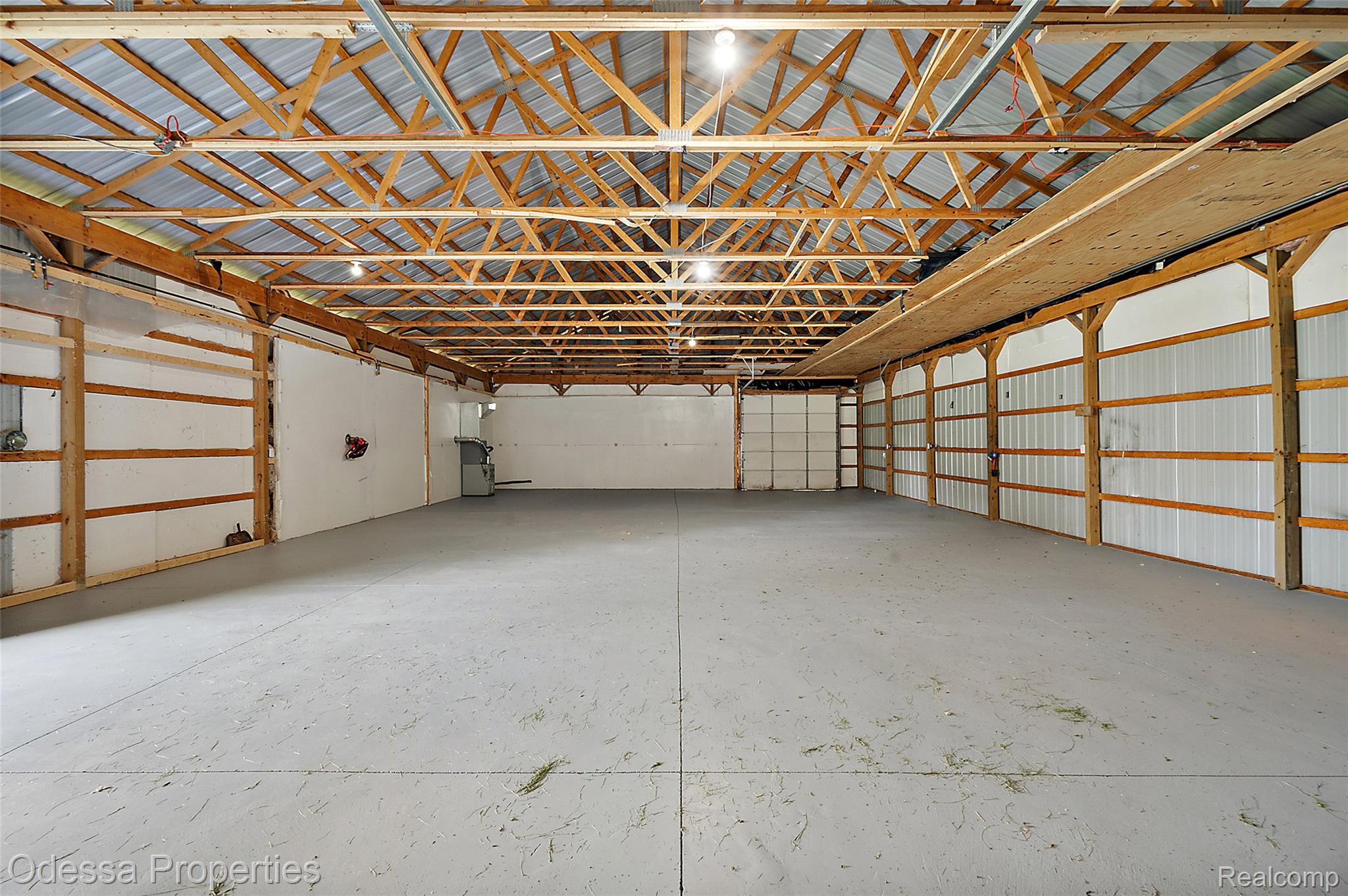 1442 Riley Center Road Memphis, MI 48041 - Photo 47 of 62 Garage with metal wall