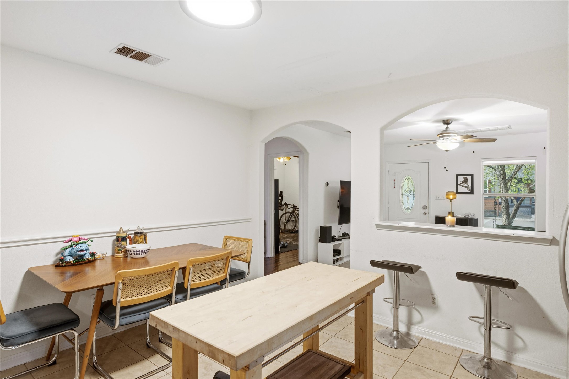 3015 Castro Street Austin, TX 78702 - Photo 13 of 40 Bright dining area with ample space connects seamlessly to the living space.
