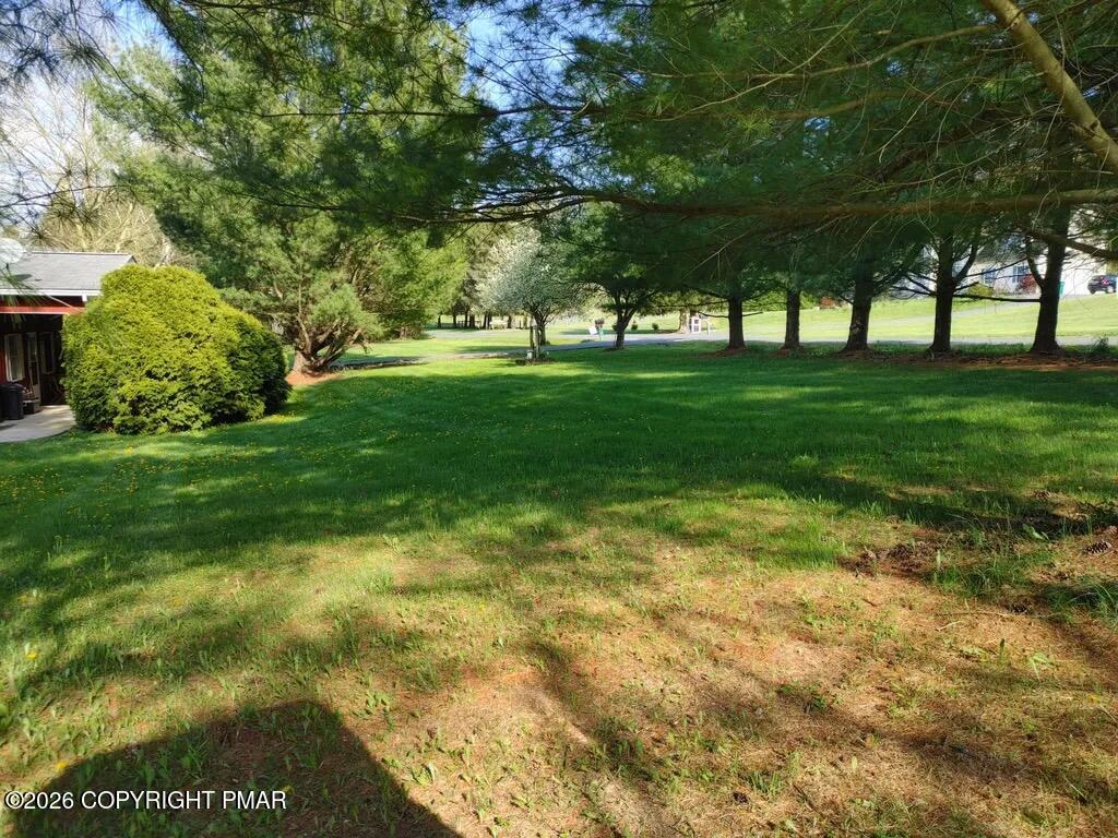 165 Old Stagecoach Road, Unit 2 Gilbert, PA 18331 - Photo 11 of 12 back & side of apt building