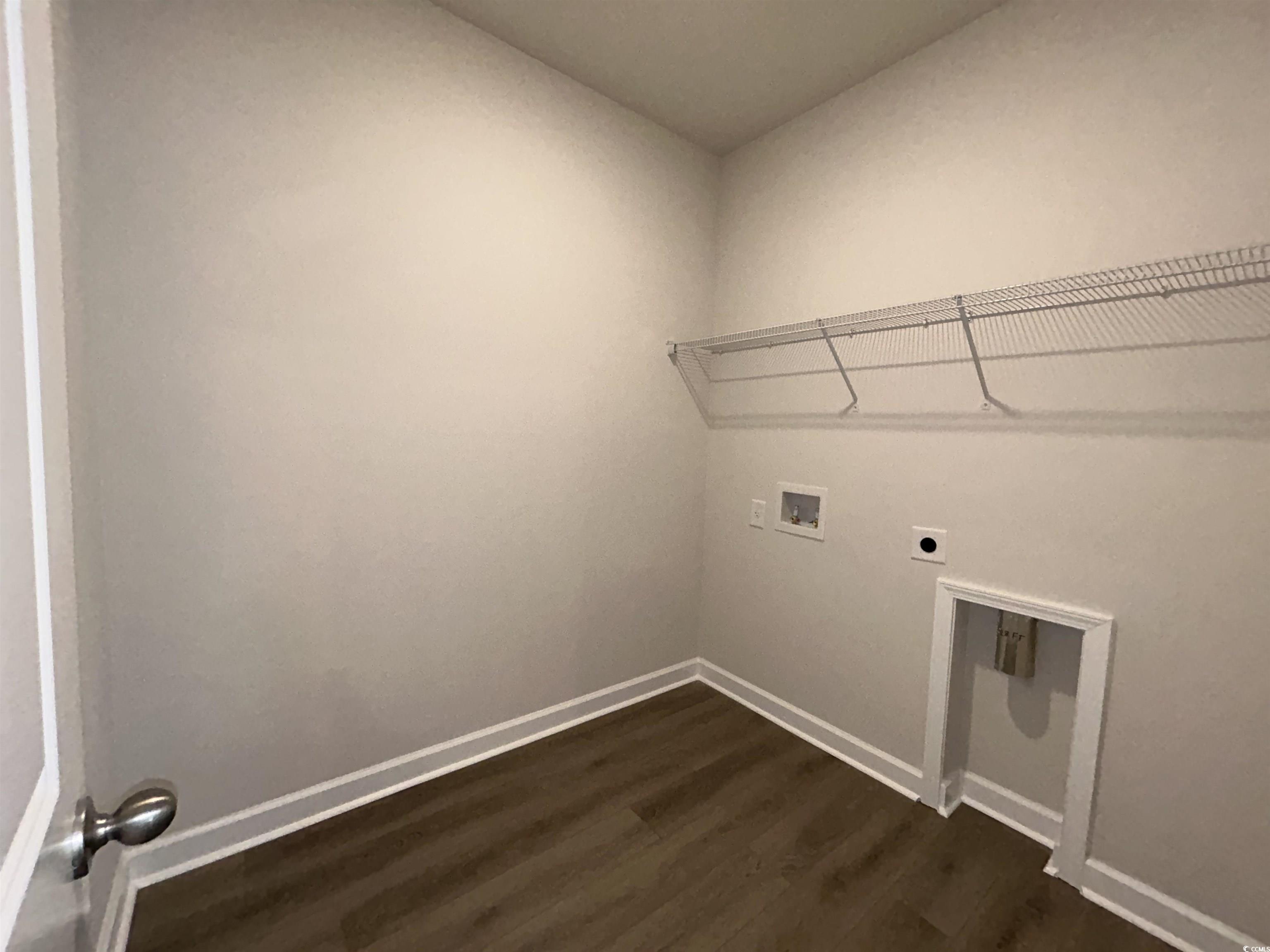 3068 Palma Way Myrtle Beach, SC 29579 - Photo 14 of 30 Laundry room featuring dark wood-style flooring, hookup for a washing machine, and hookup for an electric dryer