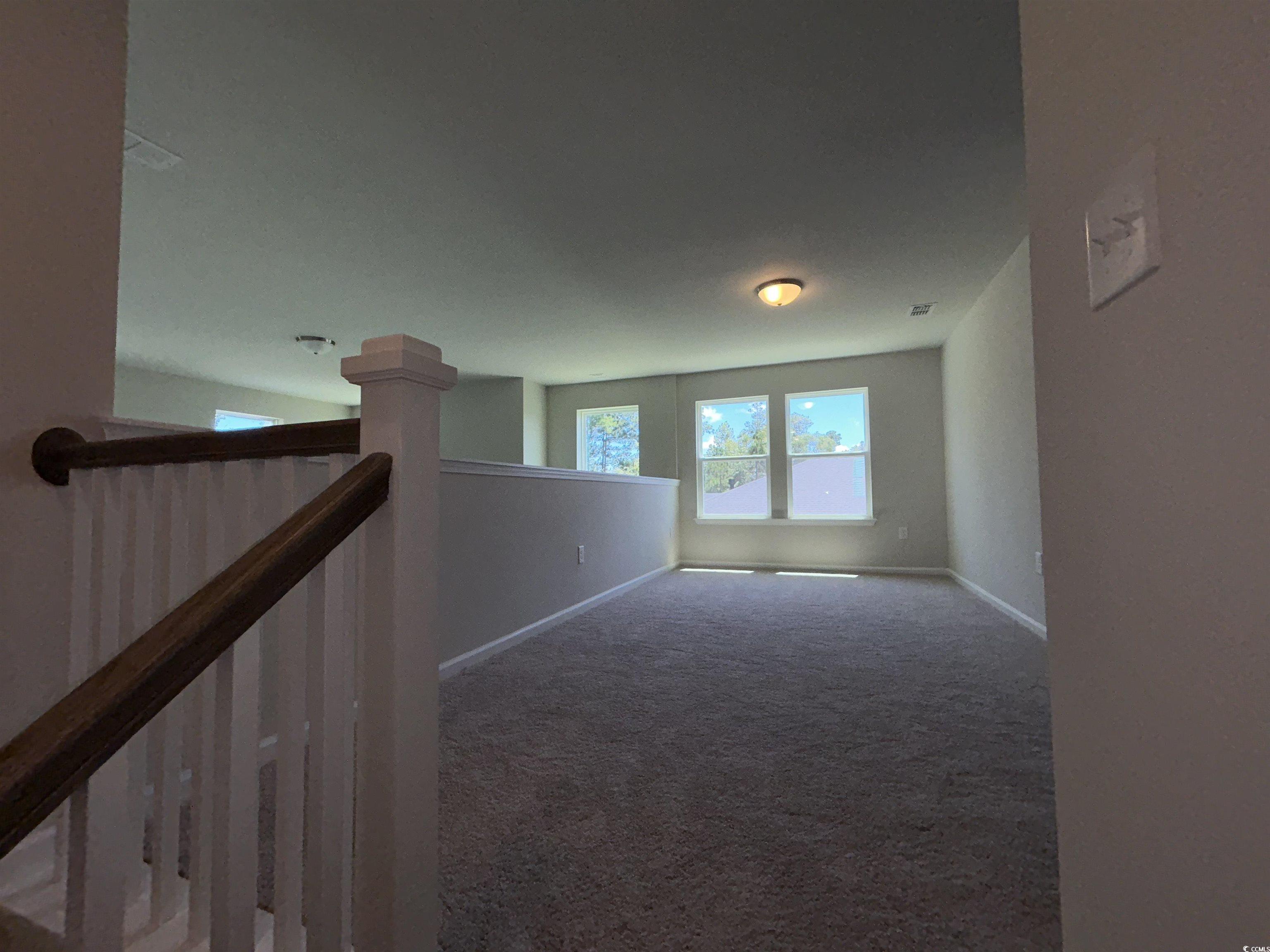 3068 Palma Way Myrtle Beach, SC 29579 - Photo 23 of 30 Spare room featuring carpet floors and baseboards