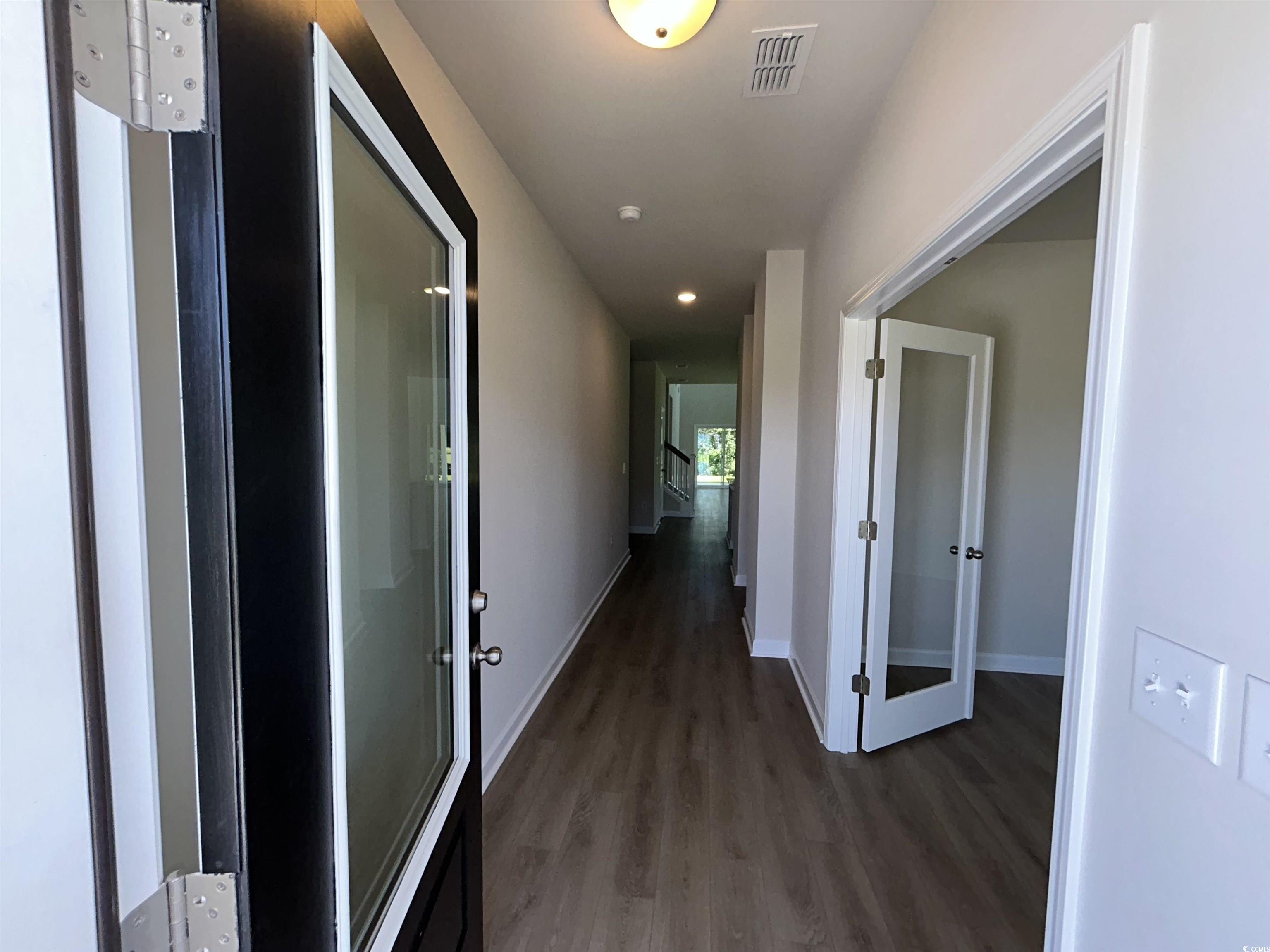 3068 Palma Way Myrtle Beach, SC 29579 - Photo 8 of 30 Corridor featuring wood finished floors and recessed lighting