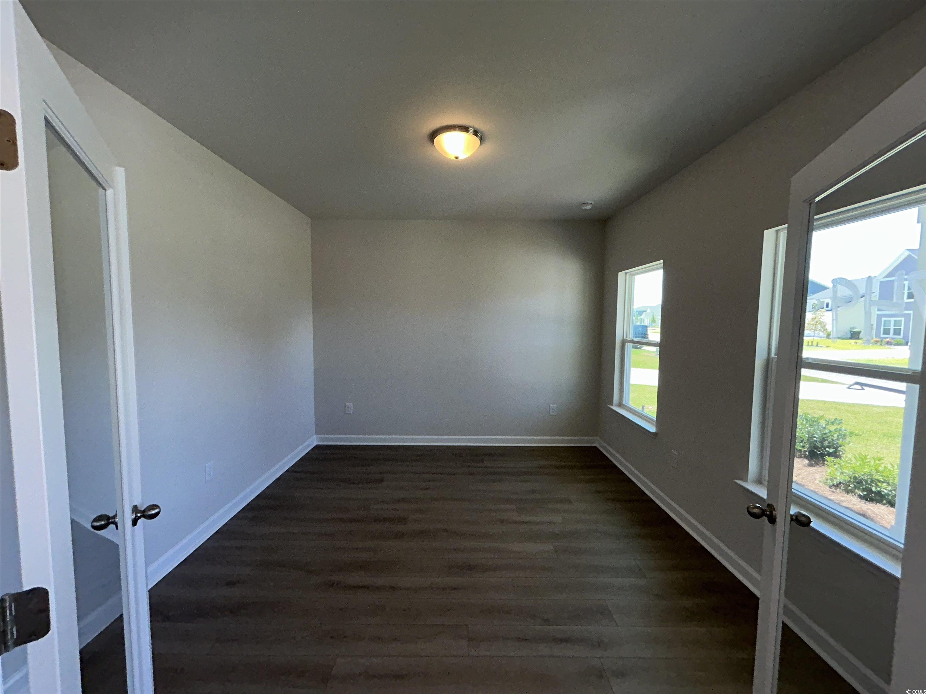3068 Palma Way Myrtle Beach, SC 29579 - Photo 9 of 30 Unfurnished room featuring dark wood-style flooring