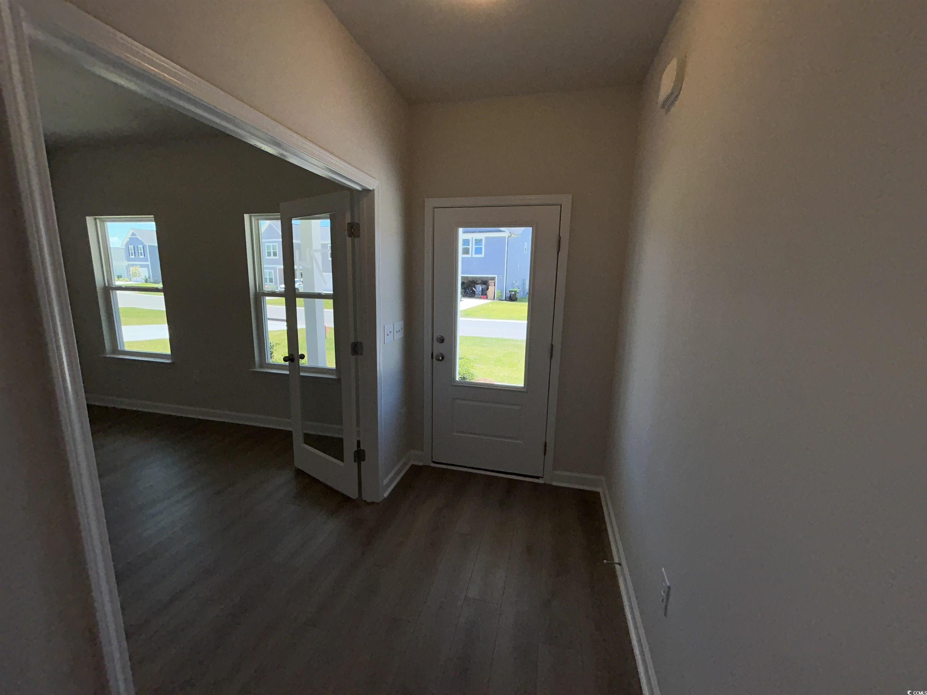 3068 Palma Way Myrtle Beach, SC 29579 - Photo 10 of 30 Entryway featuring dark wood-style floors and baseboards